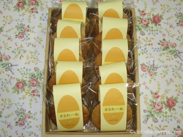 焼き菓子・ギフト まるれーぬ１０個入り　￥２１００円（２２６８円）<br>米飴が入ったやさしいお味のふわふわな<br>まんまるいマドレーヌタイプのお菓子：しあわせ菓子工房 SaCHI